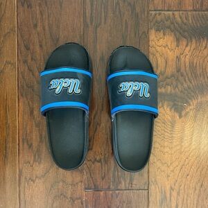 Nike UCLA Revive Foam black and blue slides